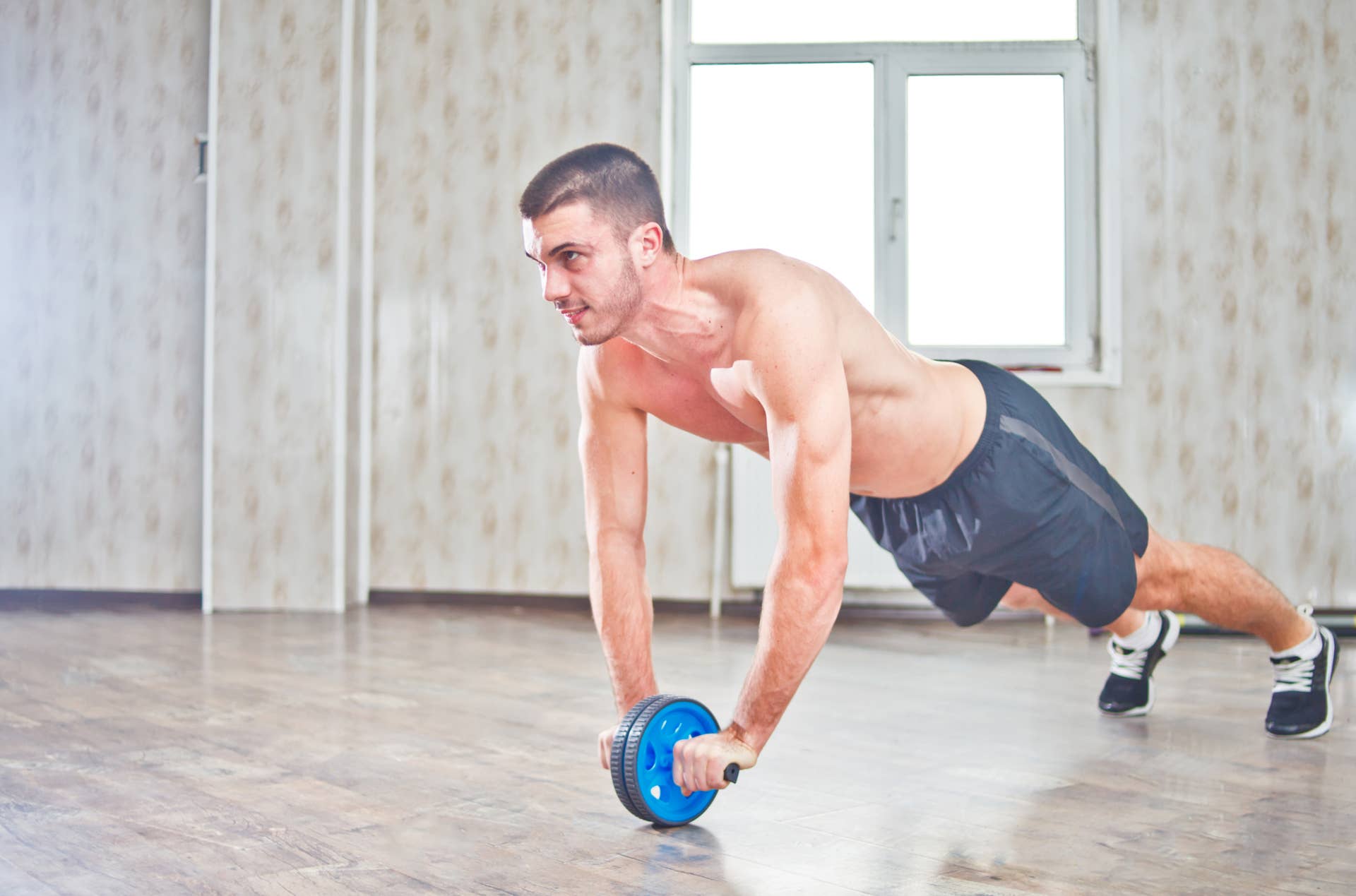 Ab Rollout: What It Is and How To Use It, According to Trainer - Men's ...