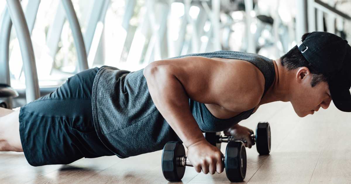 4 Ways to Keep Pushups From Hurting Your Wrists, According to a Trainer