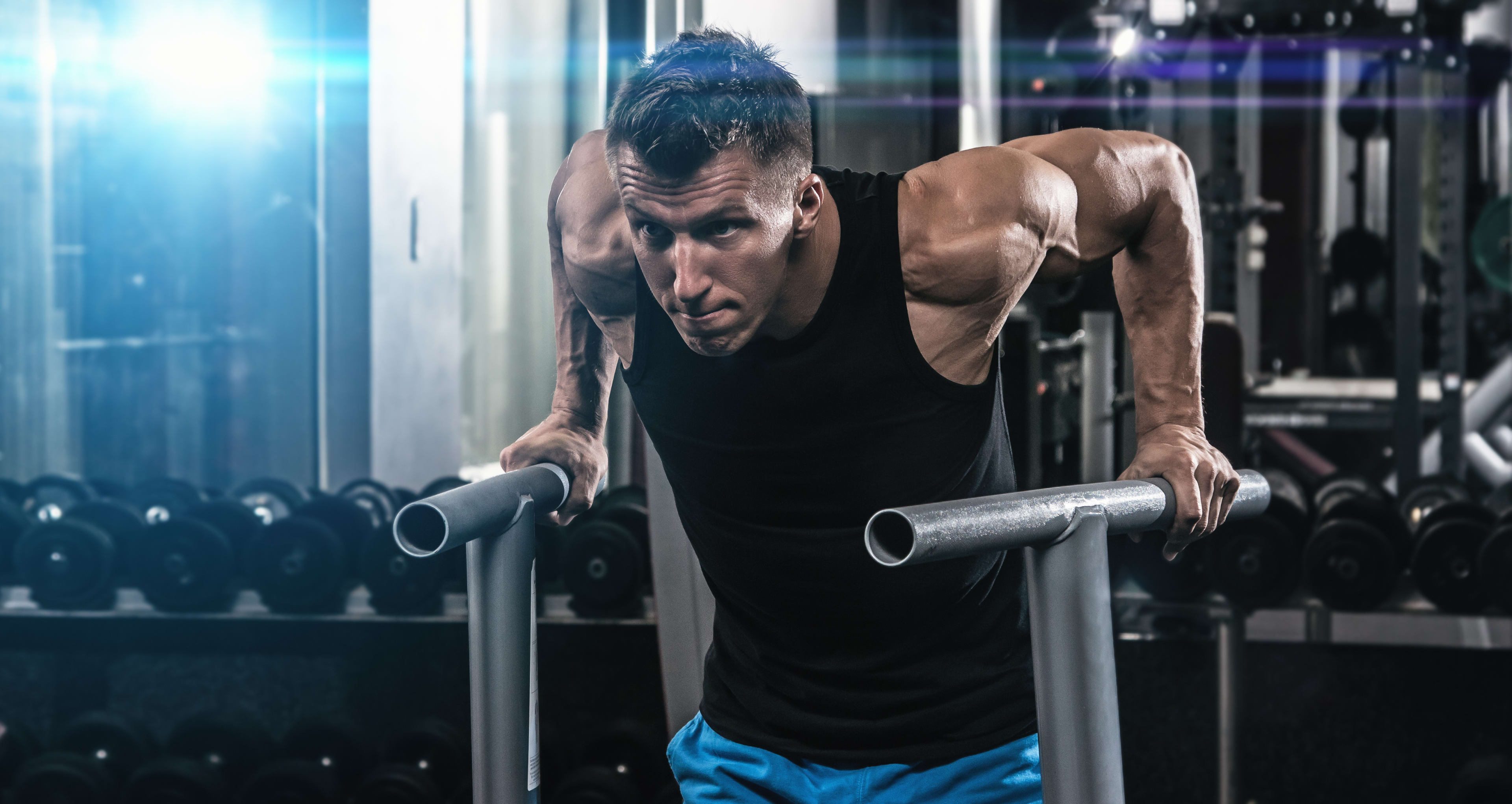 Natural bodybuilder weighted dips